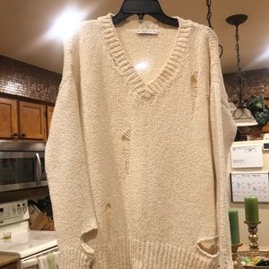 Zara Women’s Ripped Sweater